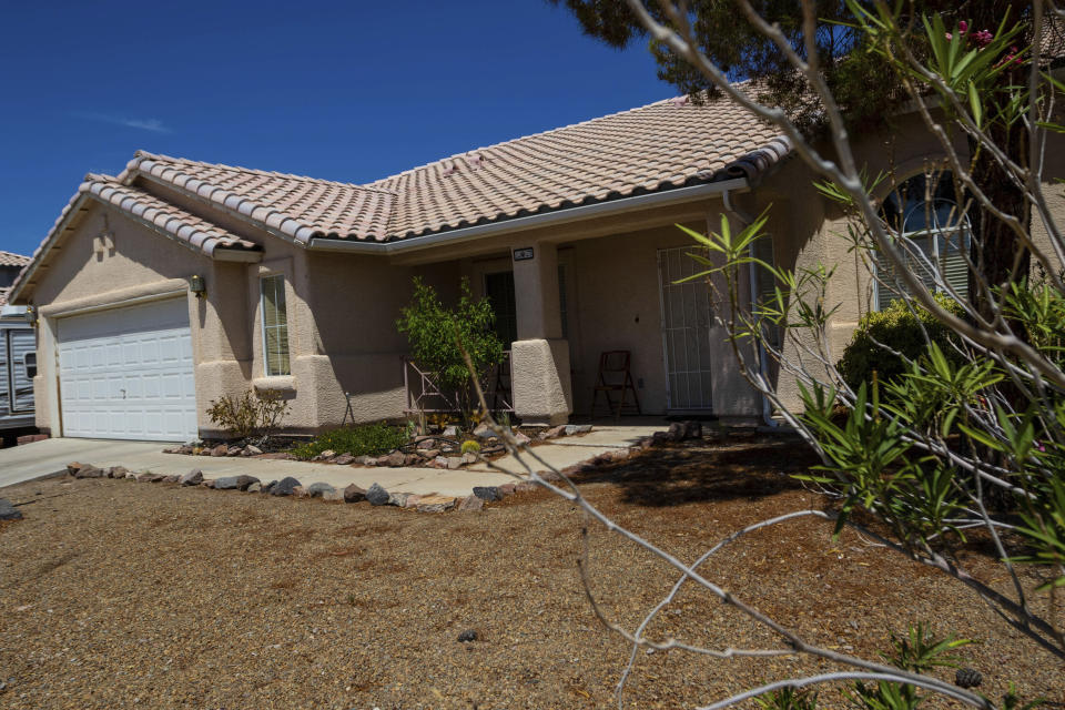 A home searched by Las Vegas police is seen on Thursday, July 20, 2023, in neighboring Henderson, Nev. The property was searched Monday, July 17, in connection with the 1996 drive-by shooting of rapper Tupac Shakur in Las Vegas. (AP Photo/Ty ONeil)