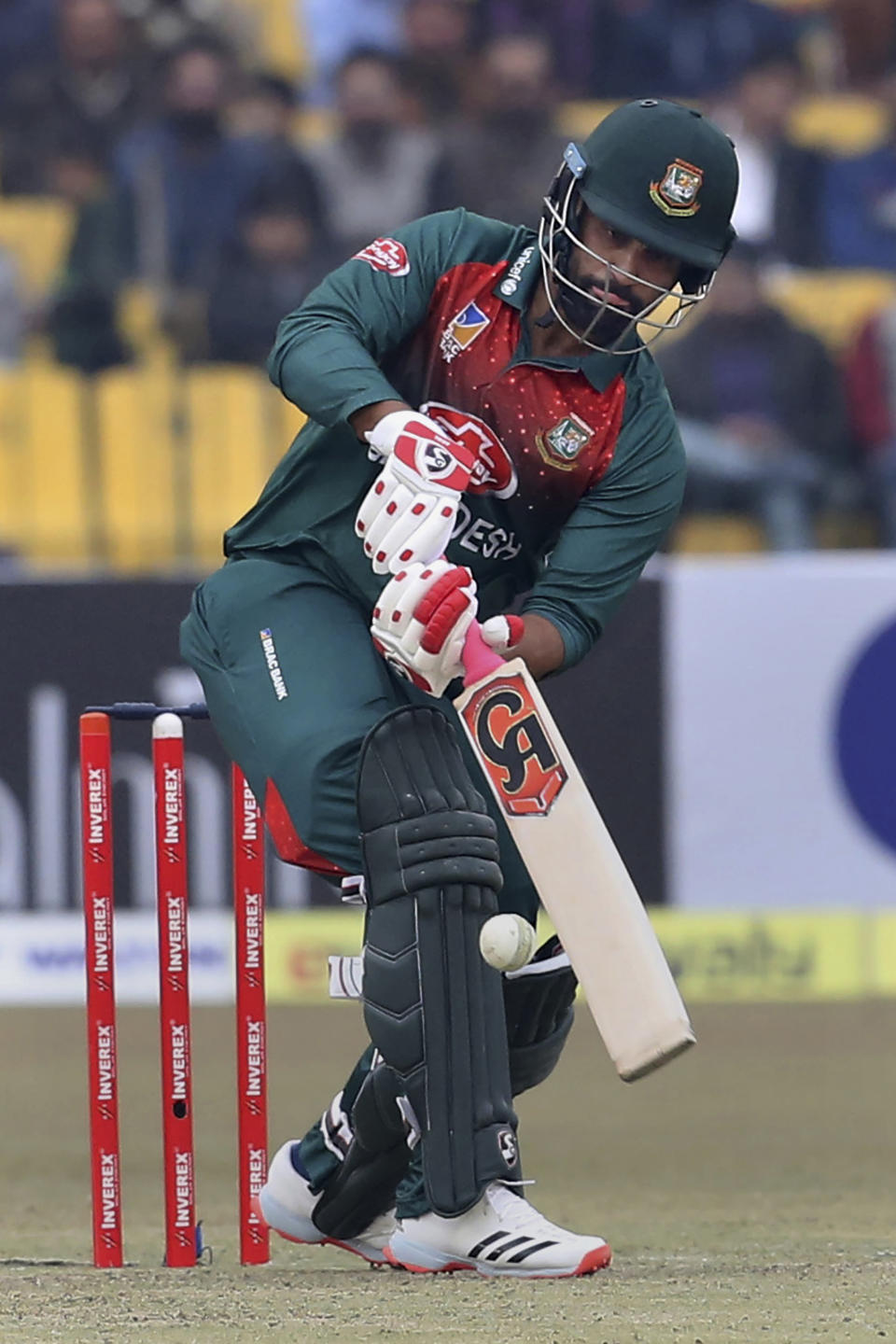 Bangladesh batsman Tamim Iqbal plays a shot during the second T20 cricket match against Pakistan at Gaddafi stadium, in Lahore, Pakistan, Saturday, Jan. 25, 2020. (AP Photo/K.M. Chaudary)
