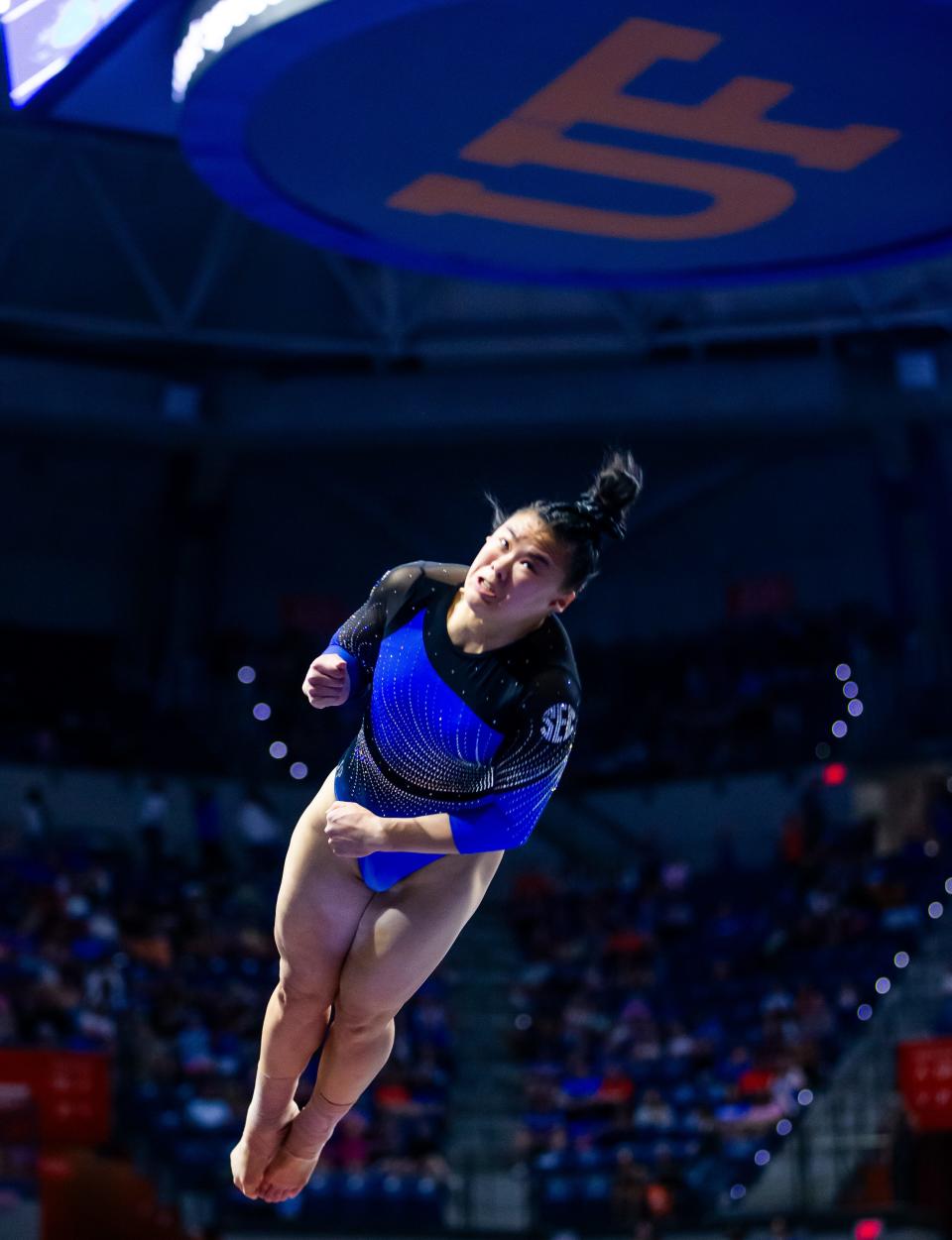 Florida Gators gymnast Ellie Lazzari is propelled through the air off the vault. The Florida Gators hosted Iowa State, NC State and LIU at Exactech Arena at The Stephen C O'Connell Center in Gainesville, FL on Friday, March 15, 2024. [Doug Engle/Gainesville Sun]