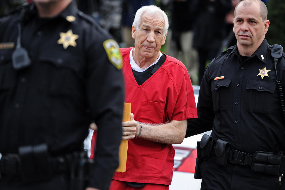 BELLEFONTE, PA - OCTOBER 09: Former Penn State assistant football coach Jerry Sandusky walks into the Centre County Courthouse before being sentenced in his child sex abuse case on October 9, 2012 in Bellefonte, Pennsylvania. Sandusky faces more than 350 years in prison for his conviction in June on 45 counts of child sexual abuse, including while he was the defensive coordinator for the Penn State college football team. (Photo by Patrick Smith/Getty Images)