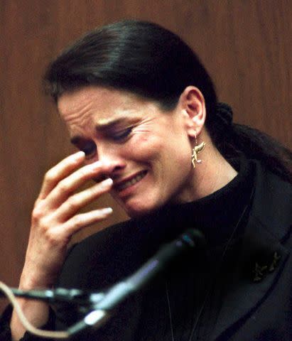 <p>Ken LUBAS/AFP/Getty Images</p> Denise Brown testified about O.J. Simpson's violent behavior on Feb. 6, 1995.