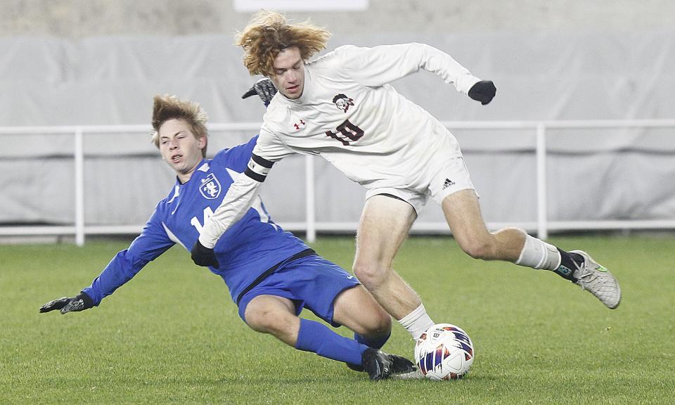 Bexley's Liam Kauffman and Lima Shawnee's Collin Scheid battle during the Division II state final Nov. 12 at Lower.com Field. Bexley lost 1-0 in a shootout.