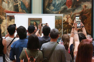 La “Joconde” prise d’assaut au Louvre, en août 2019.. PHOTO OWEN FRANKEN/THE NEW YORK TIMES