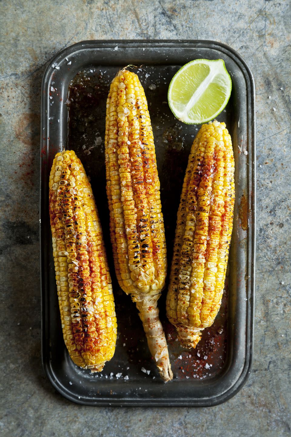 Tossing them the cob.