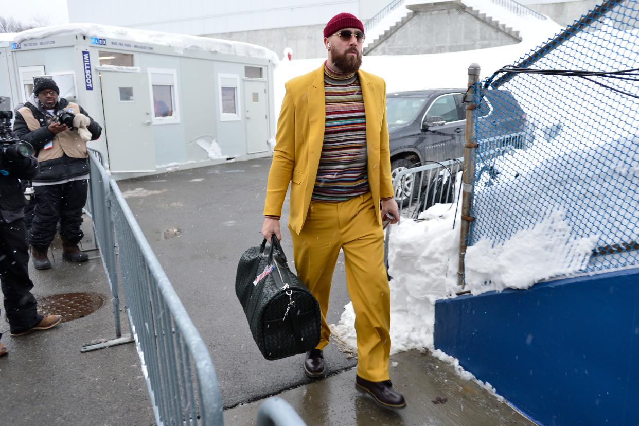 Kansas City Chiefs tight end Travis Kelce arrives at Highmark Stadium to play against the Buffalo Bills in an NFL AFC division playoff football game, Sunday, Jan. 21, 2024, in Orchard Park, N.Y. (AP Photo/Adrian Kraus)