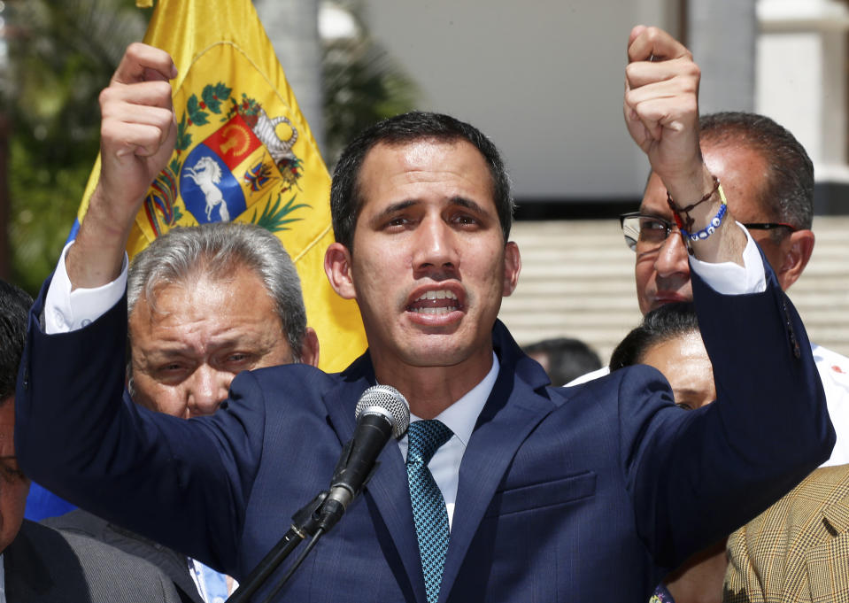 Opposition leader Juan Guaido, who has declared himself the interim president of Venezuela, speaks during a press conference on the steps of the National Assembly in Caracas, Venezuela, Monday, Feb. 4, 2019. Germany, Spain, France, the U.K. and Sweden have announced that they are recognizing Guaido as the country's interim president and are urging him to hold a new presidential election.(AP Photo/Fernando Llano)