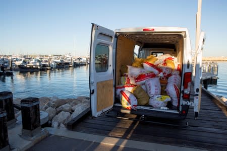 Bags containing methamphetamine are seen in a van during a police operation that, according to police, resulted in the seizure of 1.2 tonnes of the drug in Geraldton