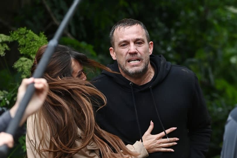 Warren Fox is seen fleeing Hollyoaks with stab wounds as Mercedes supports him