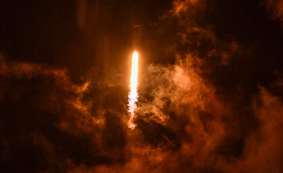 A SpaceX Falcon 9 rocket ascends skyward after its 12:33 a.m. Saturday launch from Cape Canaveral Space Force Station.