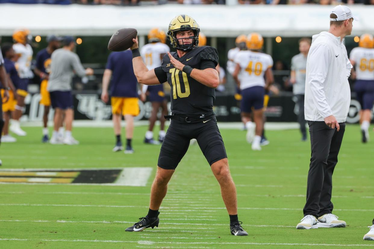 UCF quarterback John Rhys Plumlee warms up before the Knights' game with Kent State on Thursday in Orlando.