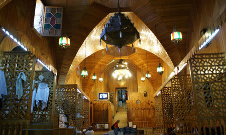 Tourists vist the historical Hamam El Nahasin, in the Old City of Aleppo, Syria October 6, 2010. REUTERS/Khalil Ashawi