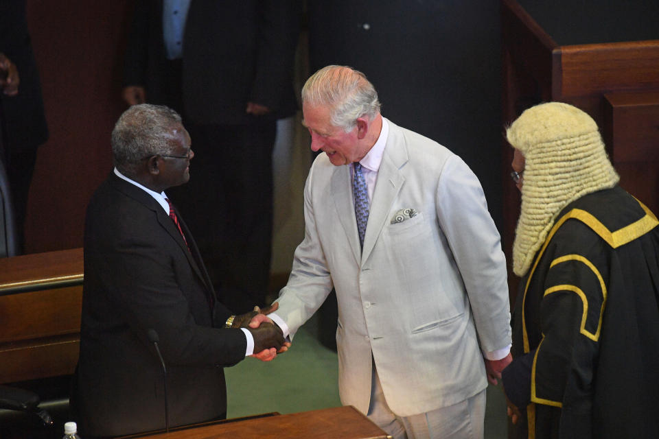 HONIARA, GUADALCANAL ISLAND, SOLOMON ISLANDS - NOVEMBER 25:  Prince Charles, Prince of Wales meets Members of Parliament after addressing the National Parliament of the Solomon Islands at Parliament House during day three of the royal visit to the Solomon Islands on November 25, 2019 in Honiara, Guadalcanal Island, Solomon Islands. The Prince of Wales and Duchess of Cornwall just finished a tour of New Zealand. It was their third joint visit to New Zealand and first in four years. The Prince is currently on a solo three day tour of The Solomon Islands. (Photo by  Victoria Jones - Pool/Getty Images)