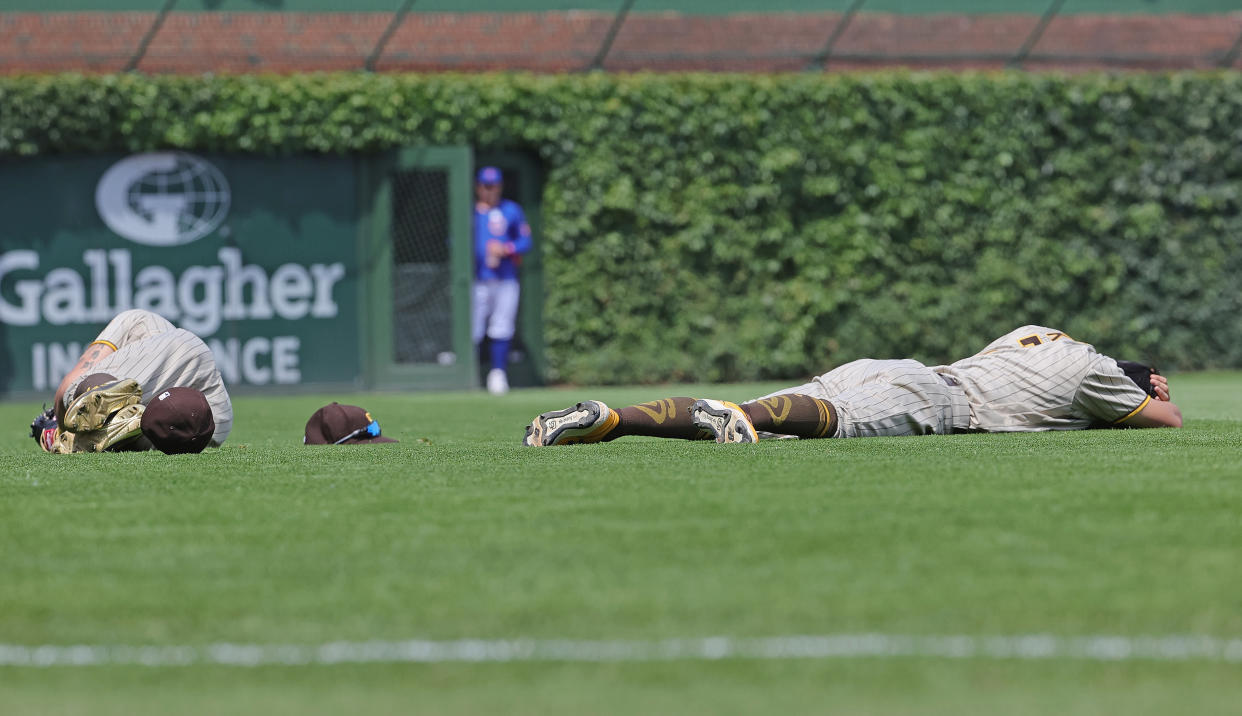 Padres' Tommy Pham and Ha-Seong Kim after colliding against the Cubs