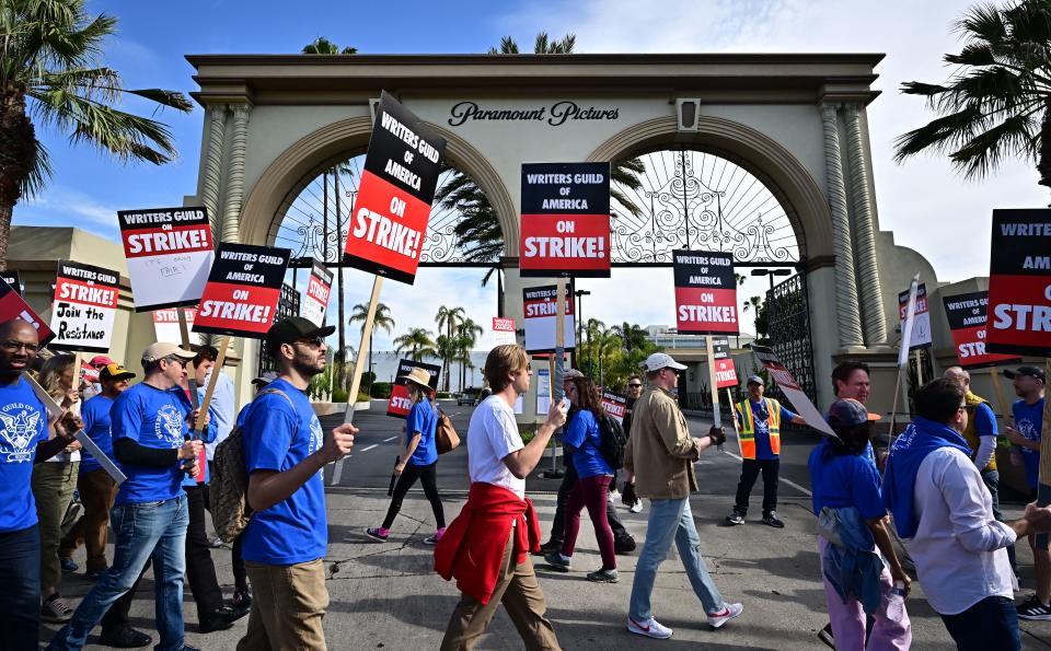 Writers walk the picket line on the second day of the television and movie writers’ strike outside of Paramount (FREDERIC J. BROWN/AFP via Getty Images)