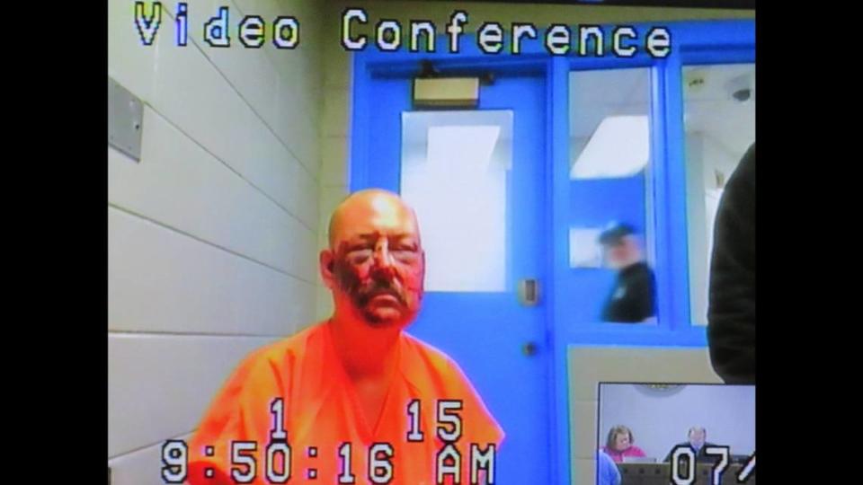 Lance Storz, accused of murdering two police officers during a stand-off in Floyd County, appears by video from jail for his arraignment on July 1, 2022.