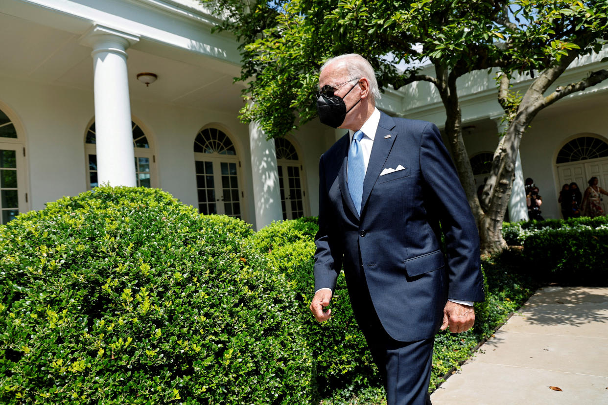 President Joe Biden walks in the Rose Garden as he returns from COVID-19 isolation to work in the Oval Office in 2022.