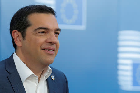 FILE PHOTO: Greek Prime Minister Alexis Tsipras arrives at a European Union summit in Brussels, Belgium, March 22, 2019. Julien Warnand/Pool via REUTERS/File Photo