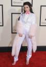 Charli XCX marches to the beat of her own drum, so any old dress would <em>not</em> do. In 2015, this white Moschino suit looked sleek and different — perfect for the budding pop icon.