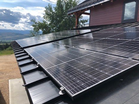 side view of solar panels on a house.