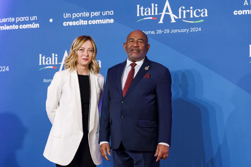 Italian Premier Giorgia Meloni, left, welcomes African Union President Azali Assoumani ahead of an Italy - Africa summit, in Rome, Monday, Jan. 29, 2024. Meloni opened a summit of African leaders on Monday aimed at illustrating Italy's big development plan for the continent that her government hopes will stem migration flows and forge a new relationship between Europe and Africa. (Roberto Monaldo/LaPresse via AP)