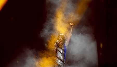 Eurovision Song Contest winner Conchita Wurst performs on stage during the opening ceremony of the 22nd Life Ball in Vienna May 31, 2014. REUTERS/Leonhard Foeger