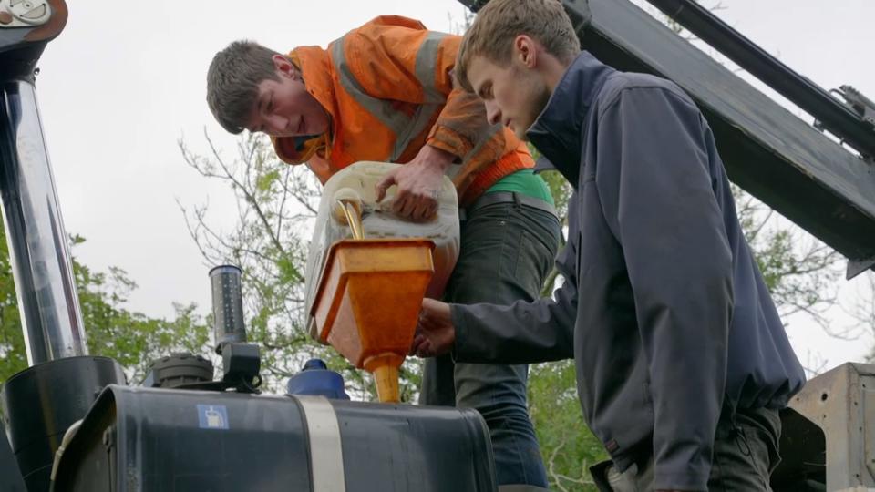 Reuben Owen: My Yorkshire Life S1 ep3 Reuben Owen and Tommy McWhirter filling up engine with oil