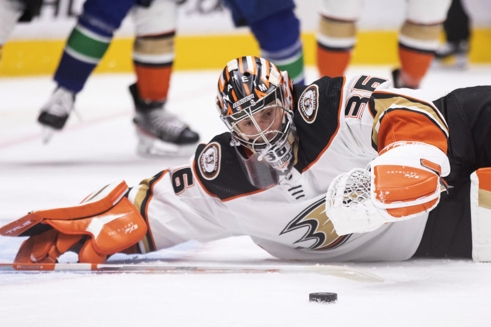 Anaheim Ducks goalie John Gibson makes a save against the Vancouver Canucks during the third period of an NHL hockey game Thursday, Nov. 3, 2022, in Vancouver, British Columbia. (Ben Nelms/The Canadian Press via AP)