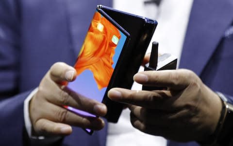 Mate X foldable 5G mobile device during a Huawei Technologies Co. launch event ahead of the MWC Barcelona in Barcelona - Credit: Bloomberg