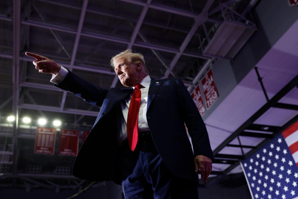 Republican presidential candidate, former President Donald Trump walks offstage after speaking at a campaign rally at the Liacouras Center on June 22, 2024 in Philadelphia, Pennsylvania.