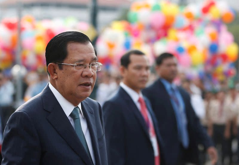 FILE PHOTO: Cambodia's Prime Minister Hun Sen attends a celebrations marking the 66th anniversary of the country's independence from France, in central Phnom Penh