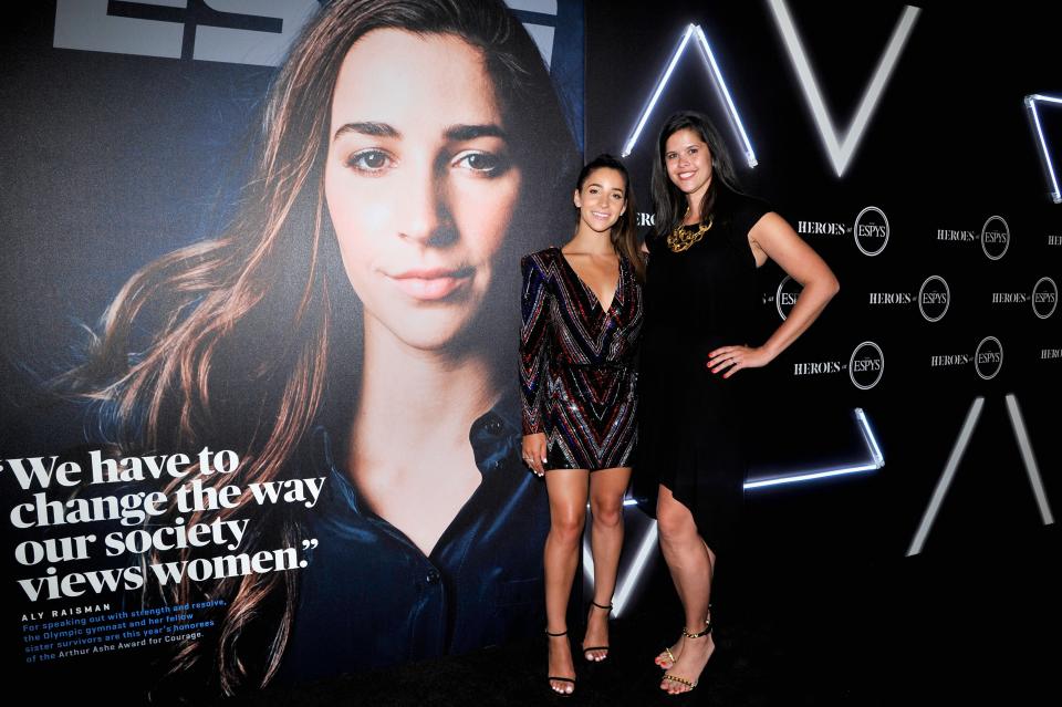 Alison Overholt, vice president and editor-in-chief of ESPN The Magazine, stands with olympic gymnast Aly Raisman at a pre-ESPYs event on July 17, 2018.