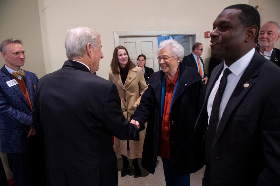 Former Montgomery Mayor Todd Strange greets Gov. Kay Ivey during the Yass Prize award ceremony at Valiant Cross Academy’s Middle School Campus.