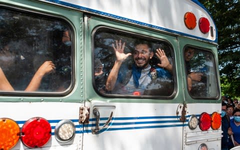 Students who had taken refuge at the Jesus of Divine Mercy church amid a barrage of armed attacks, arrive on a bus to the Metropolitan cathedral, in Managua on Saturday - Credit: Cristobal Venegas/AP