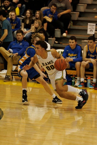 Rocco Breslin of Flat Rock drives with the ball against Jefferson on Friday, January 27, 2023.