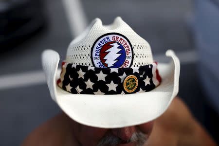 A Grateful Dead fan wears a patch of the band's logo in the parking lot before "Fare Thee Well: Celebrating 50 Years of Grateful Dead" farewell tour at Levi's Stadium in Santa Clara, California June 27, 2015. REUTERS/Stephen Lam