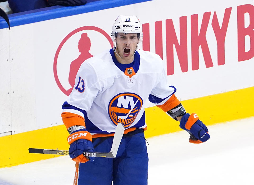 TORONTO, ONTARIO - AUGUST 07:  Mathew Barzal #13 of the New York Islanders celebrates his goal in the third period against the Florida Panthers in Game Four of the Eastern Conference Qualification Round prior to the 2020 NHL Stanley Cup Playoffs at Scotiabank Arena on August 07, 2020 in Toronto, Ontario. (Photo by Andre Ringuette/Freestyle Photo/Getty Images)