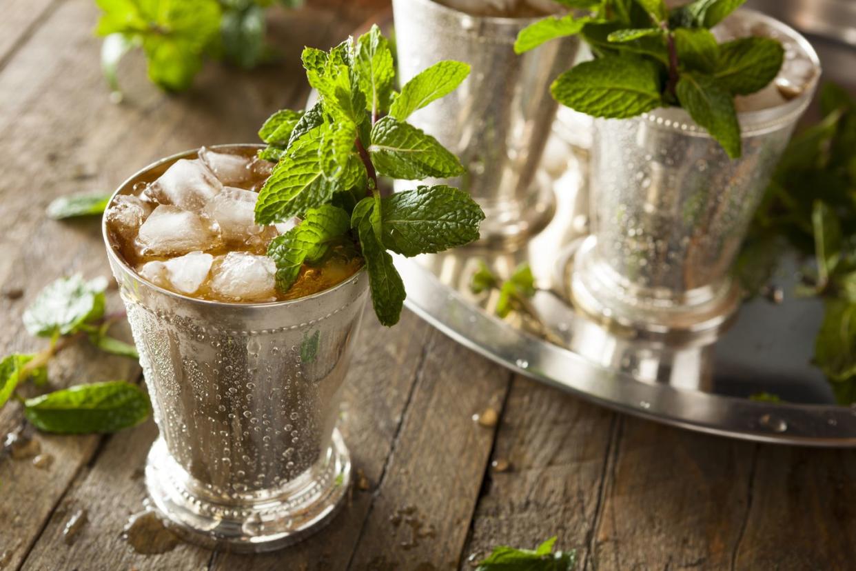 Ice cold mint julep in a metal cup