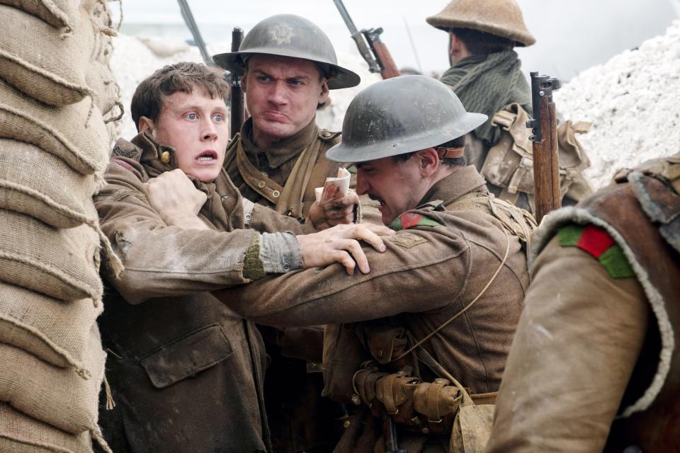 1917, (aka NINETEEN SEVENTEEN), far left: George MacKay, 2019. ph: Francois Duhamel / © Universal Pictures / courtesy Everett Collection