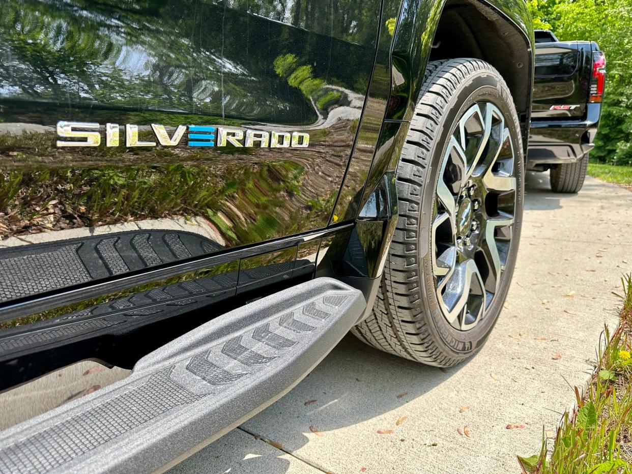 A close-up of the Silverado EV badge