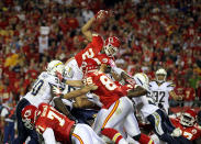 KANSAS CITY, MO - OCTOBER 31: Jackie Battle #26 of the Kansas City Chiefs leaps up and over the defense to score a touchdown during the game against the San Diego Chargers on October 31, 2011 at Arrowhead Stadium in Kansas City, Missouri. (Photo by Jamie Squire/Getty Images)