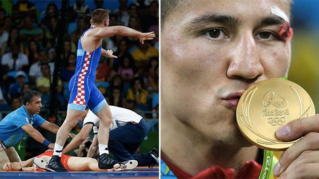 Wrestler Roman Vlasov lost consciousness but recovered to beat Denmark's Mark Overgaard Madsen for the gold medal.