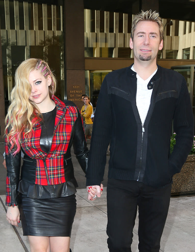 <p>Nickelback frontman Chad Kroeger took being sentimental to the next level when he decided to help Avril Lavigne with a scrapbook she had been working on. "I had been making this scrapbook of my time in the studio with a Polaroid camera. I walked into the studio and he was putting a picture in the book and I was like, ‘What’s he doing? He’s scrapbooking?” <a href="https://www.yahoo.com/music/bp/avril-lavigne-chad-kroeger-share-details-proposal-upcoming-194635499.html" data-ylk="slk:Lavigne told;elm:context_link;itc:0;sec:content-canvas;outcm:mb_qualified_link;_E:mb_qualified_link;ct:story;" class="link  yahoo-link">Lavigne told</a> Ryan Seacrest. “I walk over and he had taken a photo of himself holding the ring box and put the Polaroid in my scrapbook. And because I had stickers everywhere, he put in ‘Will you marry me?’ It was really romantic.” After the singer gushed over the photo, Kroeger presented her with a 14-carat diamond. Alas, the union — which was the second marriage for both of them — <a href="https://www.yahoo.com/celebrity/blogs/celeb-news/avril-lavigne-and-chad-kroeger-announce-their-separation-191933629.html?ref=gs" data-ylk="slk:did not last;elm:context_link;itc:0;sec:content-canvas;outcm:mb_qualified_link;_E:mb_qualified_link;ct:story;" class="link  yahoo-link">did not last</a>. They’ve recently been spotted hanging out together again, so perhaps they’re giving their love a second chance? <i>(Photo: Splash News)</i><br></p>