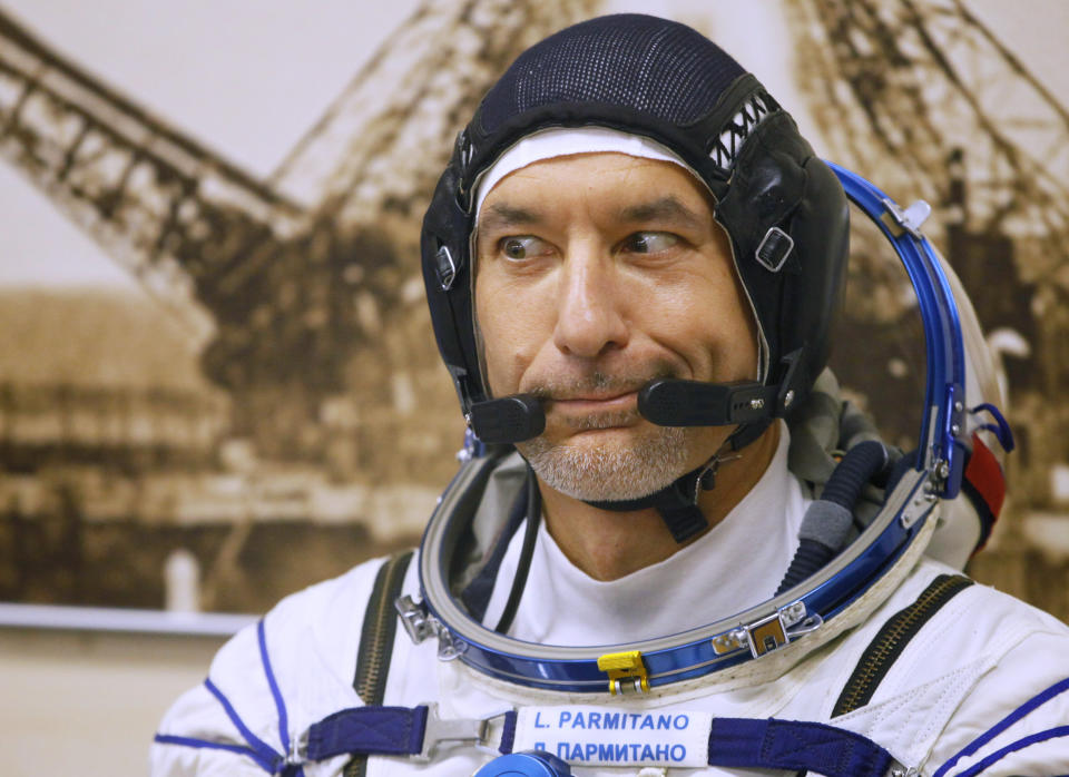 Italian astronaut Luca Parmitano, member of the main crew of the expedition to the International Space Station (ISS), gestures, prior to the launch of Soyuz MS-13 space ship at the Russian leased Baikonur cosmodrome, Kazakhstan, Saturday, July 20, 2019. (AP Photo/Dmitri Lovetsky)