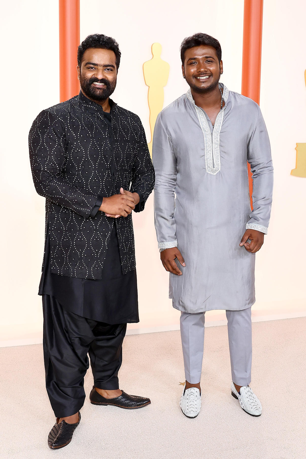 HOLLYWOOD, CALIFORNIA - MARCH 12: (L-R) Kaala Bhairava and Rahul Sipligunj attend the 95th Annual Academy Awards on March 12, 2023 in Hollywood, California. (Photo by Arturo Holmes/Getty Images )