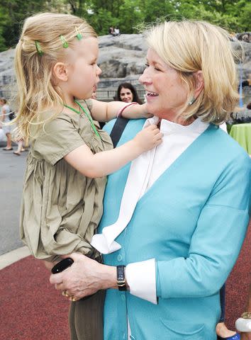 <p>Jenny Anderson/WireImage</p> Martha Stewart and granddaughter Jude at the 22nd Annual Playground Partners Family Party on May 21, 2014 in New York City.