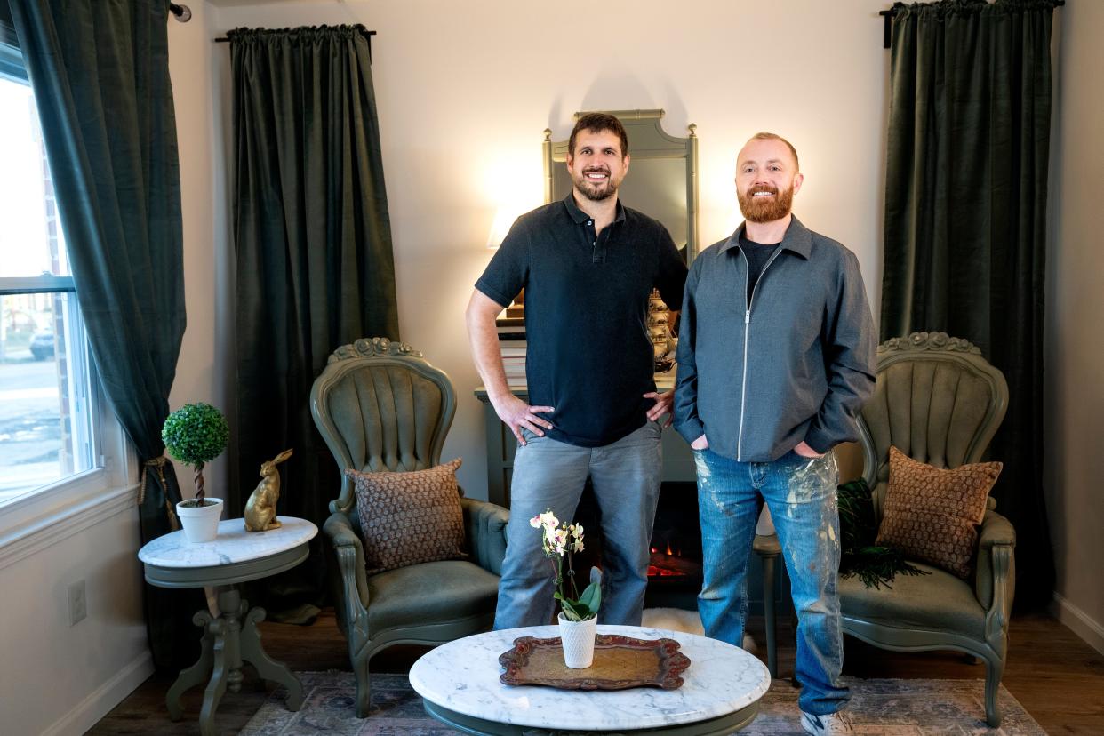 "Bargain Block" hosts Keith Bynum and Evan Thomas in the finished living room of the fairy-tale themed house featured in the season four opener of the HGTV hit.