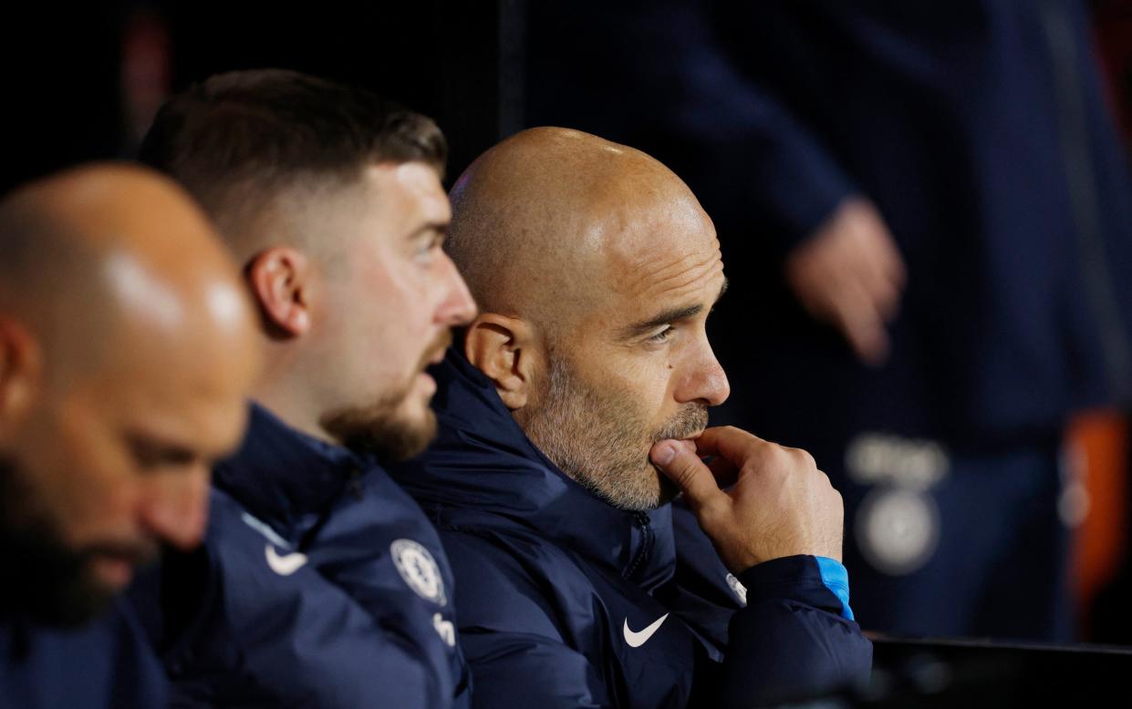 Chelsea manager Enzo Maresca watches on.