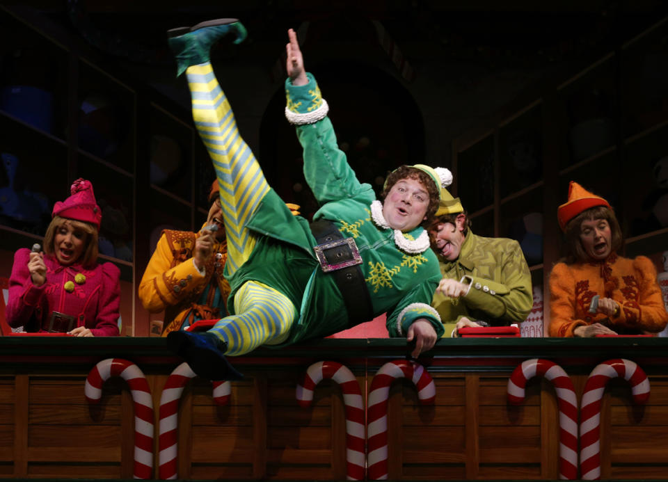 This theater image released by The Hartman Group shows Jordan Gelber, center, during a performance of the musical "Elf," in New York. (AP Photo/The Hartman Group, Joan Marcus)