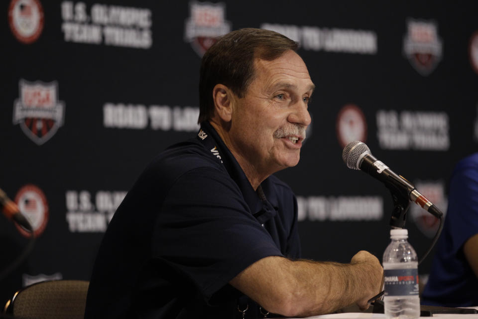 FILE - In this June 24, 2012, file photo, United States Olympic team head coach Gregg Troy speaks during a news conference at the U.S. Olympic swimming trials in Omaha, Neb. Unlike young swimmers, who may unquestioningly follow a coach's orders, Caeleb Dressel is frank in his exchanges with Troy. (AP Photo/Charlie Neibergall, File)