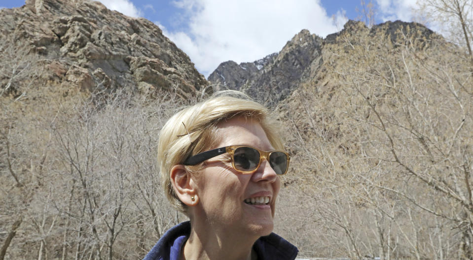Democratic presidential candidate Sen. Elizabeth Warren, D-Mass., visits Big Cottonwood Canyon Wednesday, April 17, 2019, east of Salt Lake City. Warren is in Utah Wednesday after promising to restore broader public lands protections for two of the state's high-profile national monuments if elected president. It's a move that would not endear her to Utah's GOP establishment but could appeal to voters across the West angered by President Donald Trump's decision to shrink the monuments. (AP Photo/Rick Bowmer)